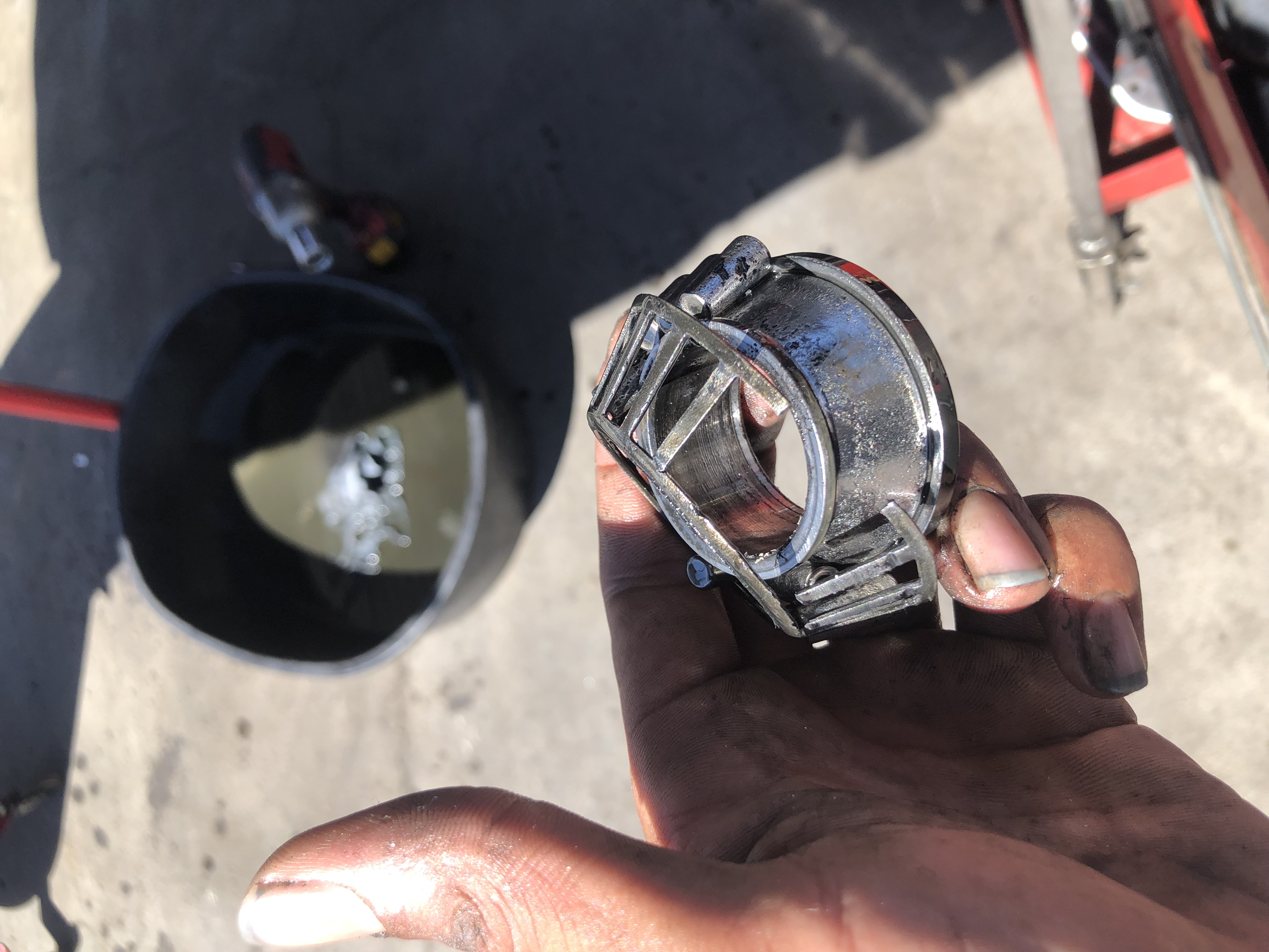 Holding the part we're replacing